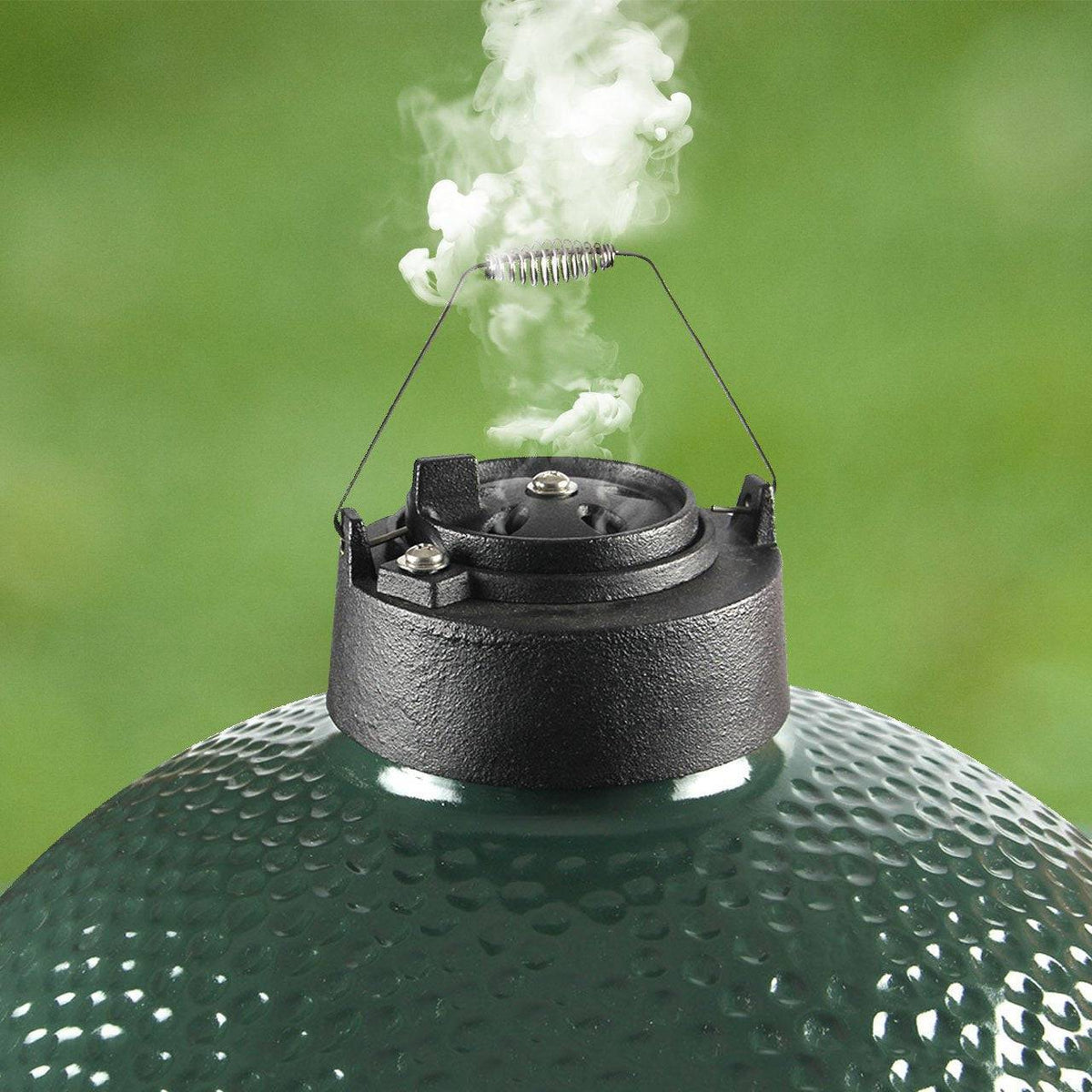 https://www.grillpartsamerica.com/cdn/shop/files/dracarys-parts-default-title-dracarys-cast-iron-vented-chimney-cap-for-big-green-egg-dual-function-metal-top-43933893394715_1200x1200.jpg?v=1703818023